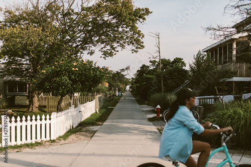 vacationers riding bikes on Fire Island New York