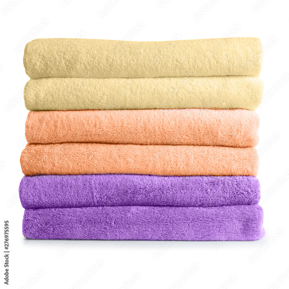 Stack of fresh towels isolated on white