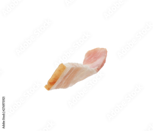 Cut fresh tasty bacon on white background