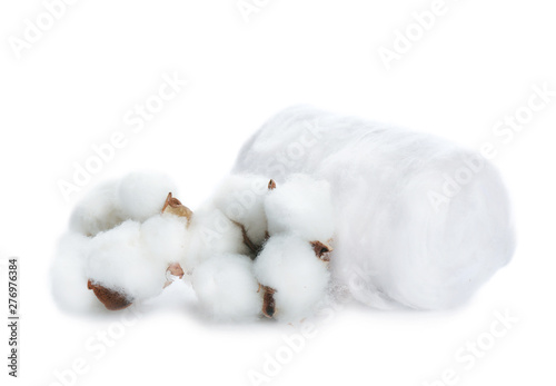 Beautiful flowers and cotton roll on white background