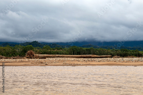 View of Beni river and rainforest of Madidi national park in the upper Amazon river basin in Bolivia, South America photo