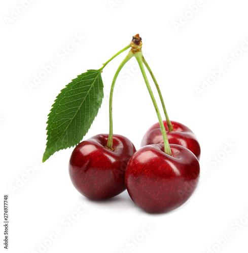 Delicious ripe sweet cherries on white background