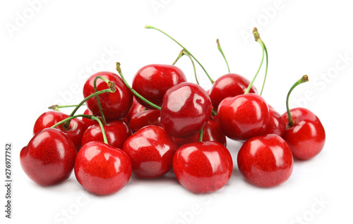 Billede på lærred Heap of ripe sweet cherries on white background