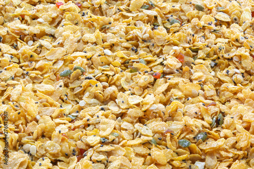 Yellow cereal for breakfast mix with grains and caramel became to snack