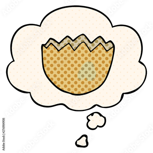 cartoon cracked eggshell and thought bubble in comic book style