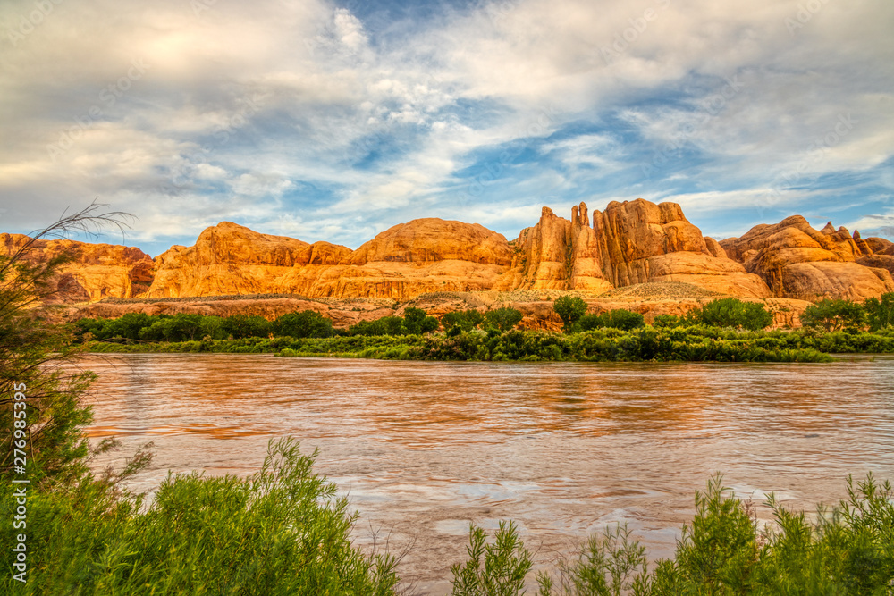 River Flowing Through Sandstone Canyon