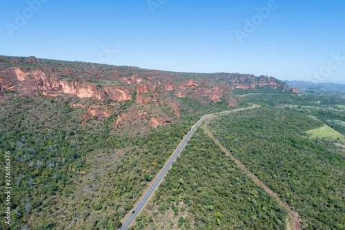 Aerial view of MT 241 road, way to Chapada dos Guimarães, Mato Grosso, Brazil. Great landscape. Travel destination. Vacation travel. Touristic point.