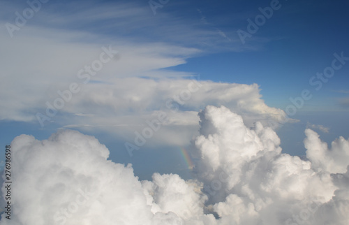 Rainbow Peeking Through the Clouds photo