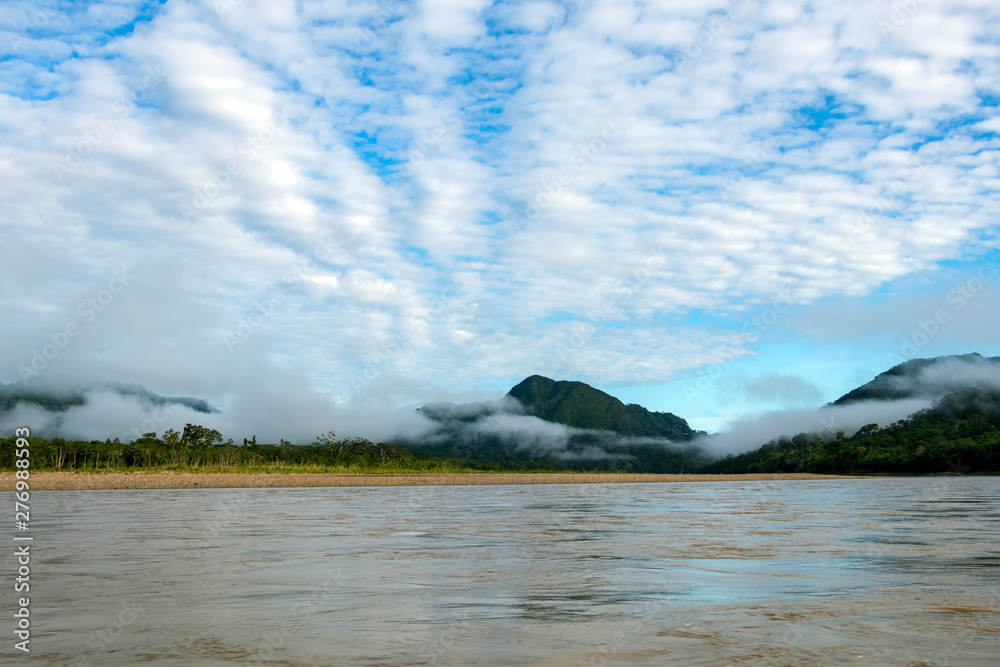 Green rainforest mountains in clouds, Amazon river basin, South America