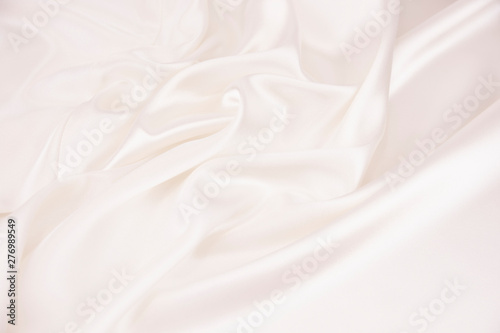 The texture of the satin fa...