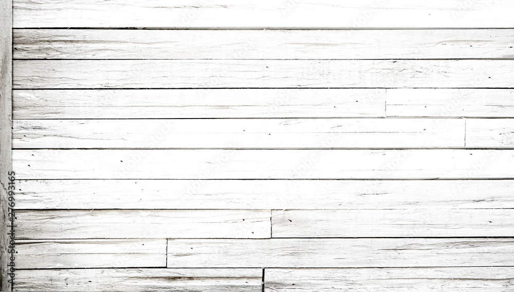 Rustic painted wood wall or floor. Rough wooden planks. Peeling white paint with light neutral flat faded tones. Rustic painted wood wall or floor. Rough wooden planks. Peeling white paint with light neutral flat faded tones.