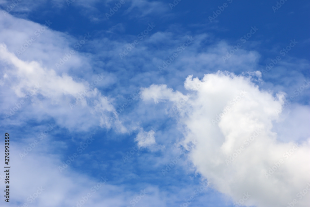 The vast blue sky nature background and white clouds