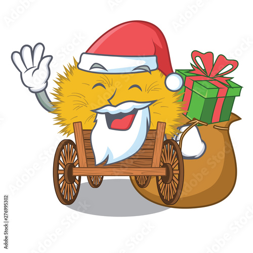 Santa with gift miniature haydire above cartoon wood table