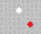 Jigsaw puzzle and 1 red piece