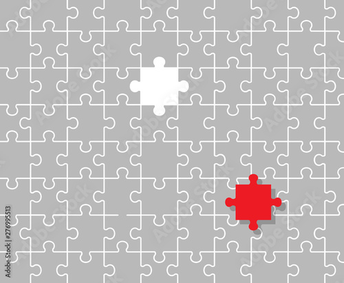 Jigsaw puzzle and 1 red piece