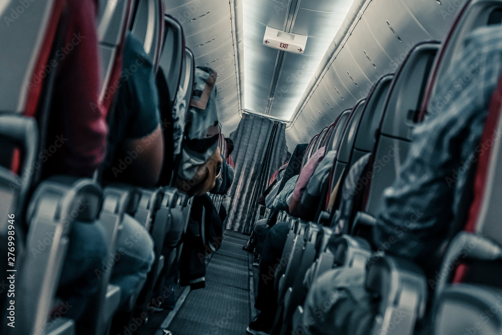Plane danger. Aircraft emergency. Passengers in a turbulence area - obrazy, fototapety, plakaty 