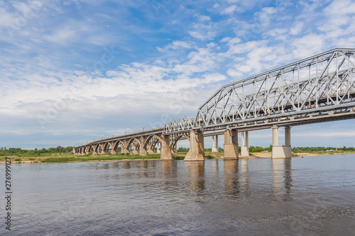 Bridge over the Volga River with reflection in water, Nizhny Novgorod