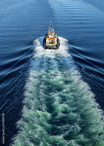 tugboat and waves photo