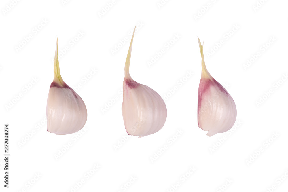 cloves of young garlic isolate on a white background