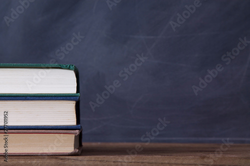 books and blackboard, concept of back to school
