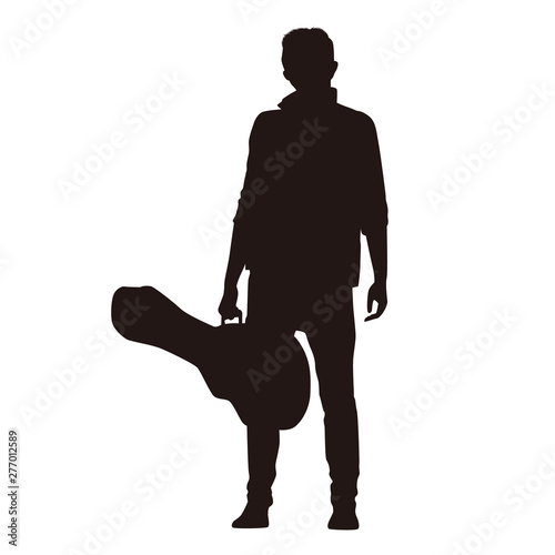 Silhouette Of Man With Guitar Stands