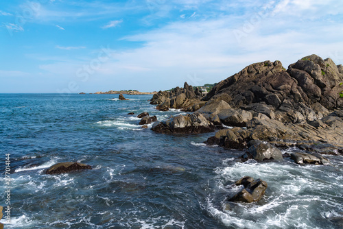Beautiful Tanesashi kaigan Coast. The coastline includes both sandy and rocky beaches, and grassy meadows scenic views