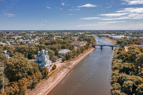 Scenic aerial view of river in ancient touristic town Vologda in Russian Federation. Beautiful summer sunny look of water in urban area of capital of russian province