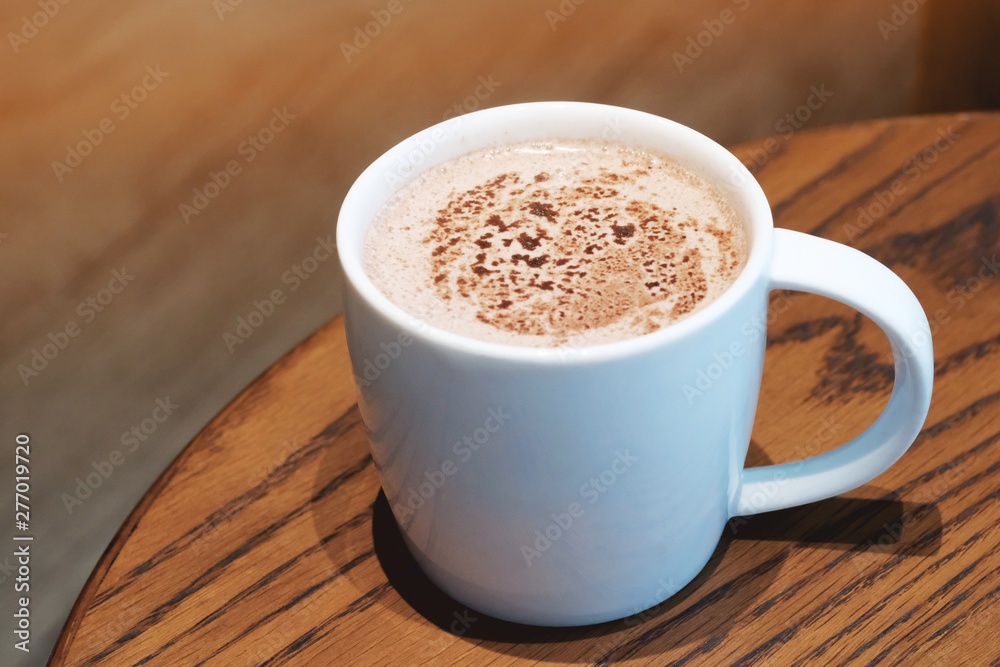 A cup of chocolate milk in the cafe A cup of chocolate milk in the cafe