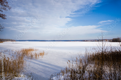 winter landscape with snow covered lake
