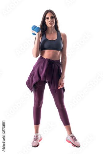 Sporty fit healthy young brunette woman posing with dumbbells looking at camera. Full body isolated on white background. 