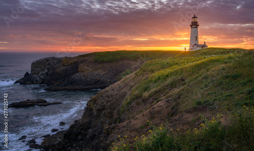Yaquina Head Lighthouse at sunset photo