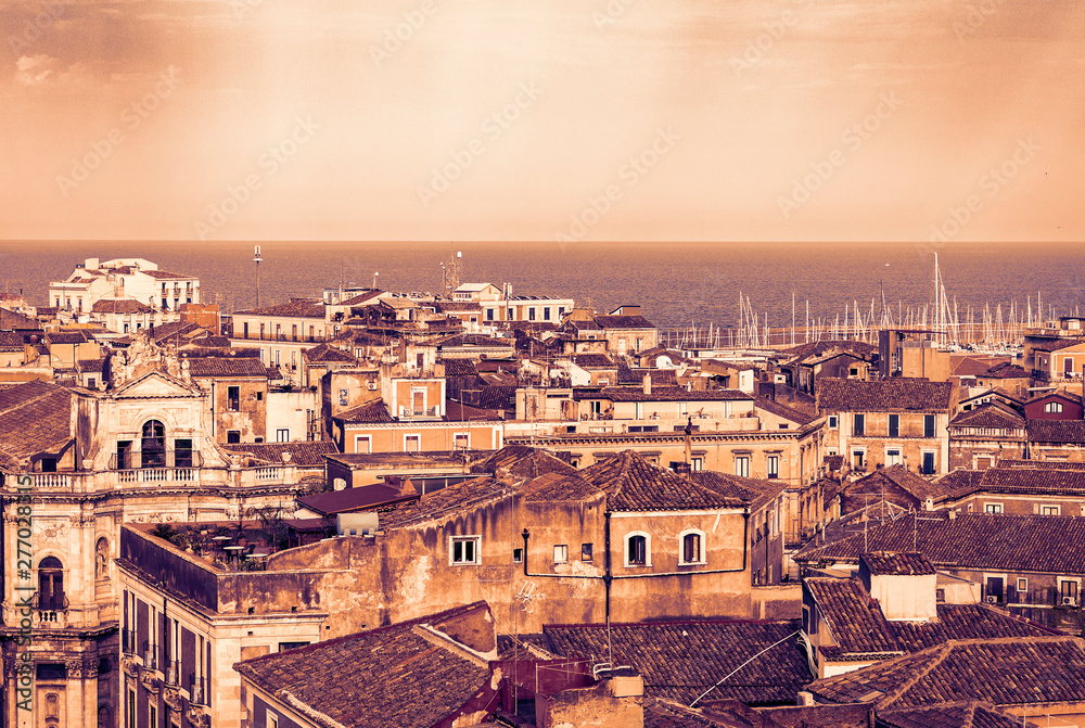 Catania sunset, aerial cityscape, traditional architecture of Sicily,  Southern Italy.