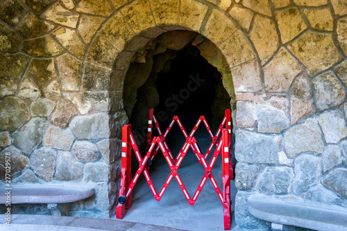 Close up of folding fence or red and white folding barrier. No entry or passage is closed