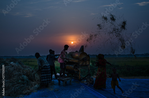 people working at sunset time