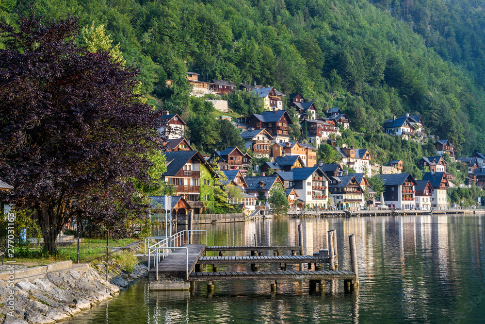 Early morning in an ancient Austrian city on the shore of an Alpine lake among the mountains.