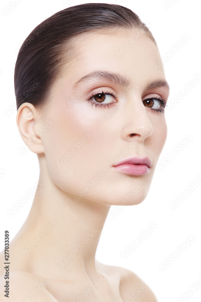 Portrait of young beautiful woman with clean makeup
