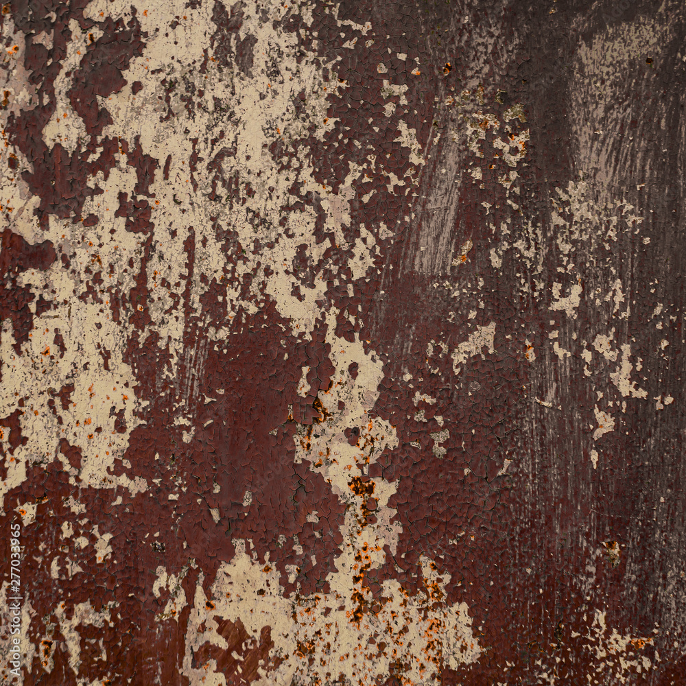 Old shabby rusty metal wall. Shabby, cracked brown paint. Grunge background