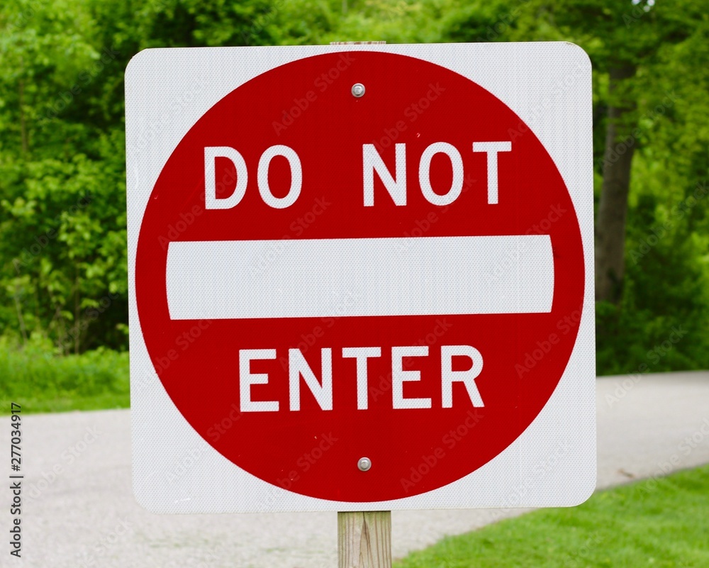 A close view of the red and white do not enter sign.