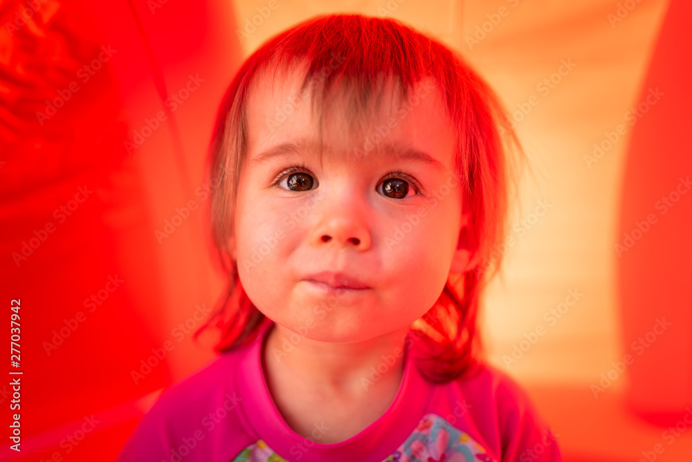 Cute baby girl with big brown eyes outdoors portrait Cute baby girl with big brown eyes outdoors portrait
