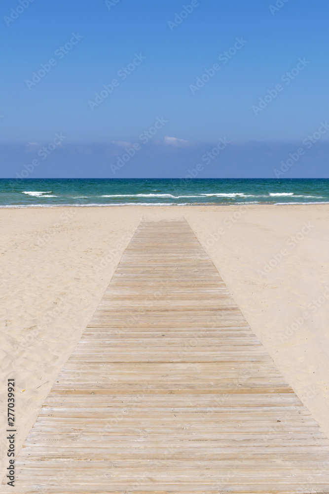 wooden path to the sea from the beach
