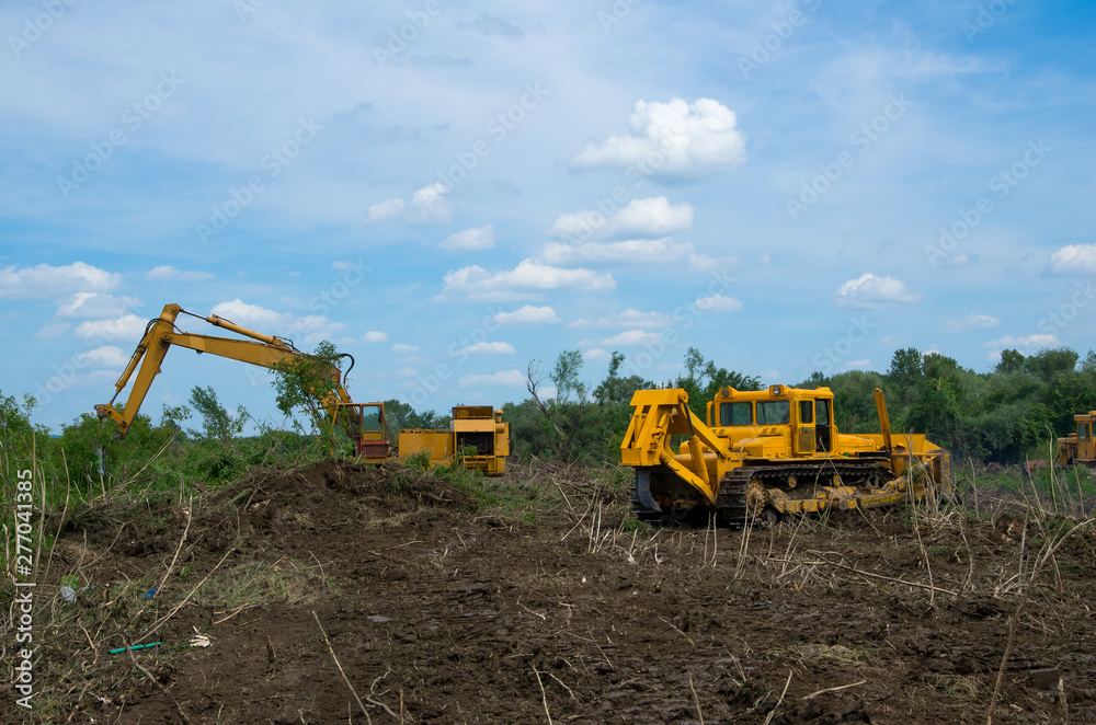 Bulldozer and excavator. Mechanical Site Preparation for Forestry.