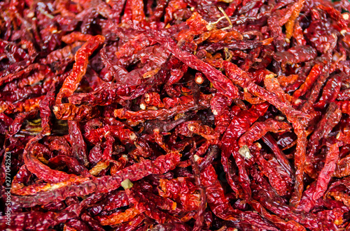 Dry peppers - Red chilies background - Selective focus 