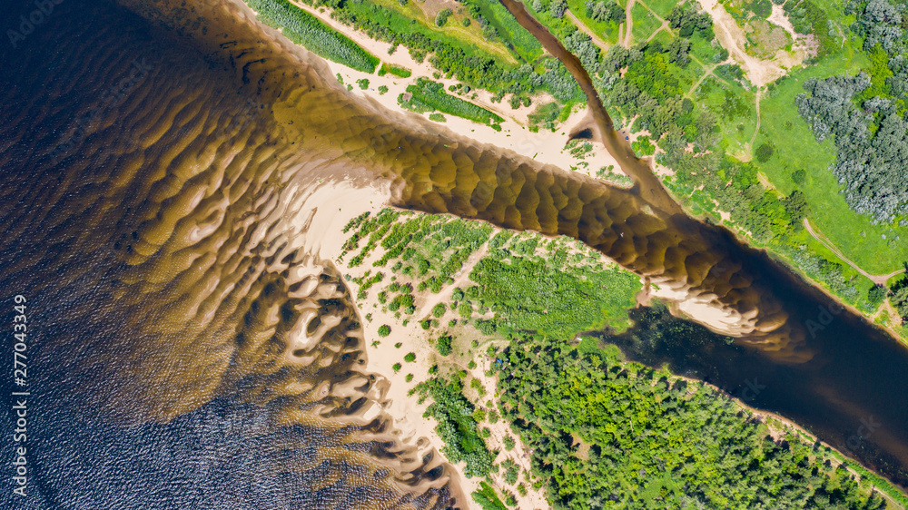 Aerial photography with drone landscape a small river flows into the Volga  river. The middle band of Russia. foto de Stock | Adobe Stock