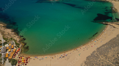 Aerial drone photo of famous tropical bay and beach of Ftelia in the centre of island of Mykonos, Cyclafes, Greece © aerial-drone