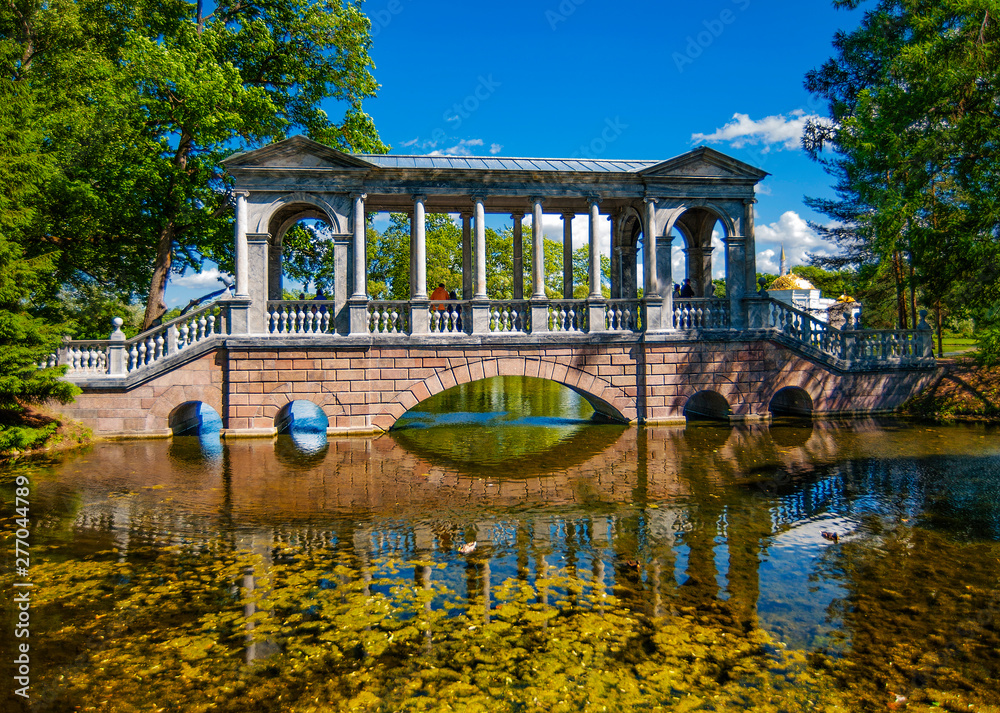 The marble bridge at the confluence of the stream into the Big Pond is considered an exquisite work of Russian classicism.