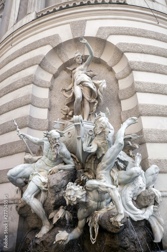 Fountain white marble statue Sea Power in Vienna, Austria