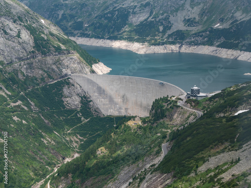 Dam and Reservoir of a Hydroelectric Powerplant in Alpine Landscape -  Malta Valley, Carinthia, Austria photo