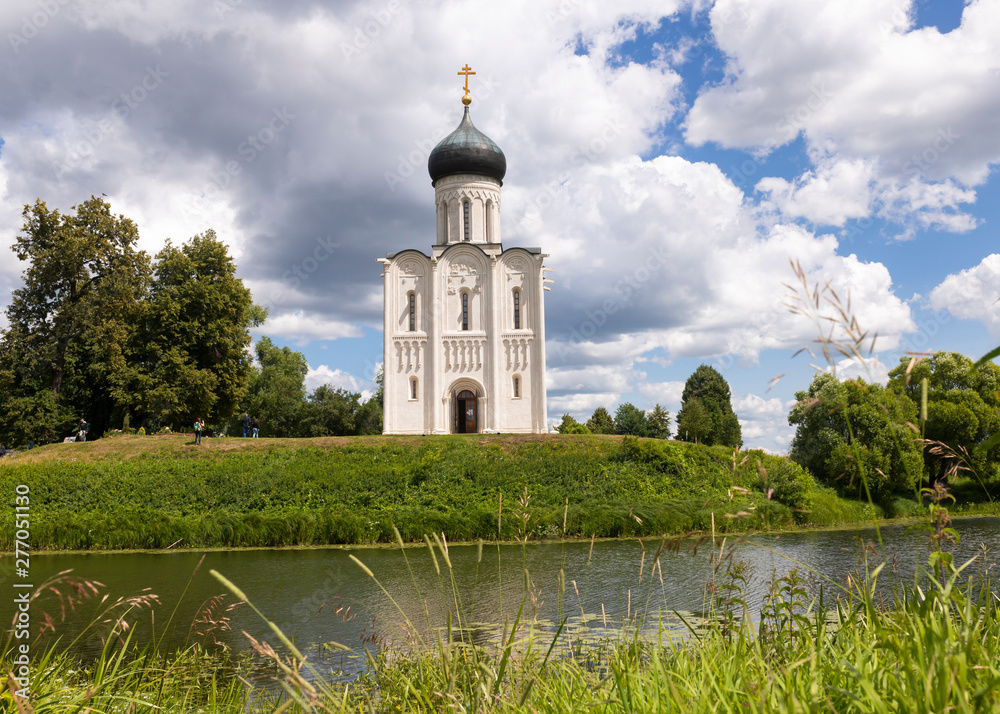 Orthodox church Protection of the Most Holy Theotokos on the Nerl on a summer day, Russia Orthodox church Protection of the Most Holy Theotokos on the Nerl on a summer day, Russia