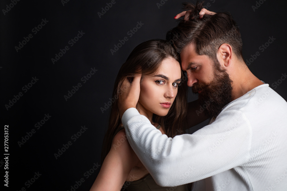 Passionate man gently kissing beautiful woman with desire. Young couple having passionate intense sex. Intimate relationship and sexual relations. Young lovers couple. Passionate man gently kissing beautiful woman with desire. Young couple having passionate intense sex. Intimate relationship and sexual relations. Young lovers couple.