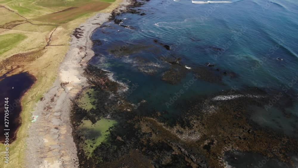 Iceland drone footage on the Ytri Tunga seal beach near the ocean in beautiful sunny spring weather